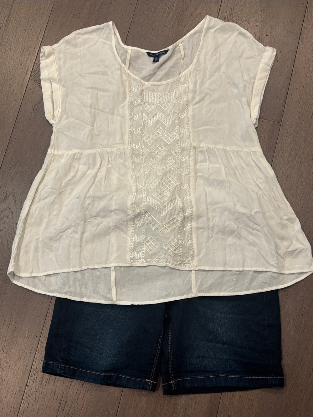 Blouse and denim shorts